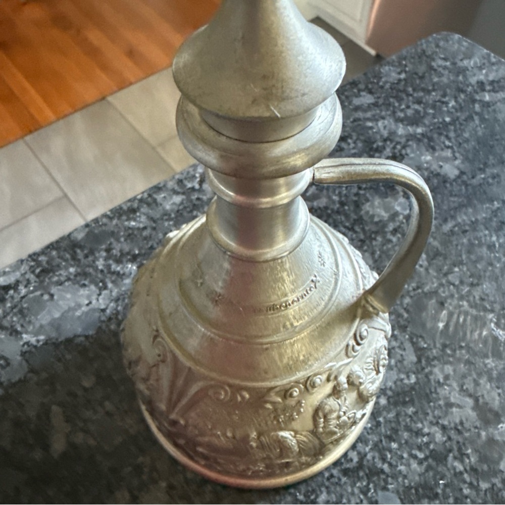 Ornate Silver Pitcher